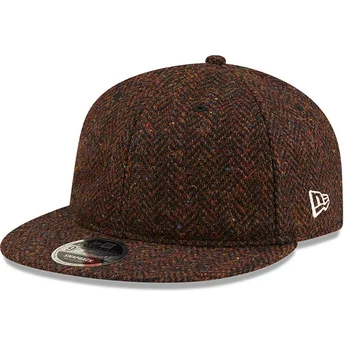 Gorra plana marrón ajustable 9FIFTY Tweed de New Era