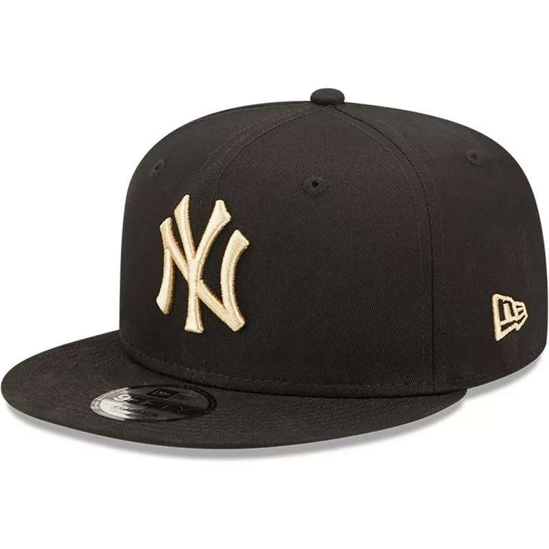 gorra-plana-negra-snapback-con-logo-beige-9fifty-league-essential-de-new-york-yankees-mlb-de-new-era