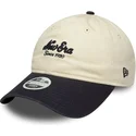 gorra-curva-beige-y-azul-marino-ajustable-para-mujer-9twenty-de-new-era