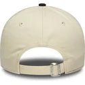 gorra-curva-beige-y-azul-marino-ajustable-para-mujer-9twenty-de-new-era