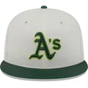 gorra-plana-beige-y-verde-ajustada-59fifty-clr-dvlp-de-oakland-athletics-mlb-de-new-era