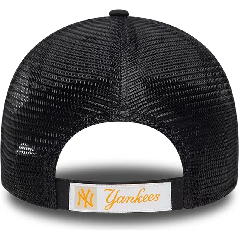 gorra-trucker-azul-marino-ajustable-con-logo-naranja-9forty-homefield-midi-de-new-york-yankees-mlb-de-new-era