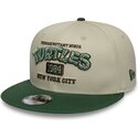gorra-plana-verde-y-beige-snapback-para-nino-9fifty-de-tortugas-ninja-de-new-era
