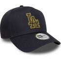gorra-curva-azul-marino-snapback-con-logo-dorado-e-frame-metallic-outline-de-los-angeles-dodgers-mlb-de-new-era